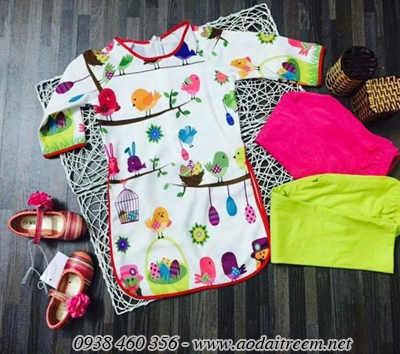 ao-dai-cho-be-cach-tan-hinh-chim-cu-mau-trang.jpg